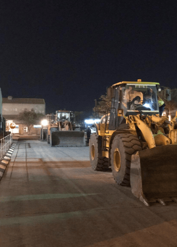 Bulldozers on a road Bulldozers on a road